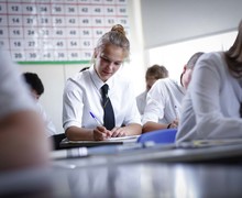 Girl working in class