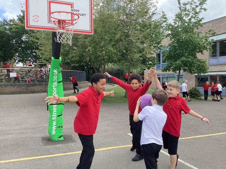 Marnel pupils playing basketball
