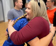 Matthew Arnold student celebrating with a hug   Copy