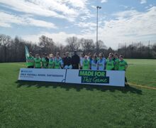 Twickenham students on the field with Rachel and Ian